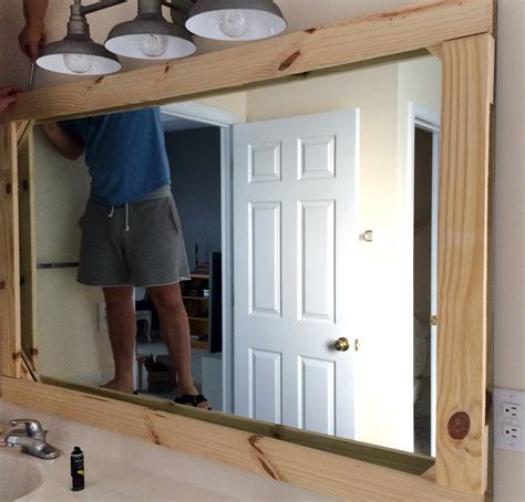 add metal brackets to wood frame mirror|diy wooden mirror framing.